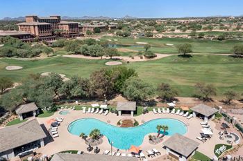 an aerial view of a swimming pool at the resort
